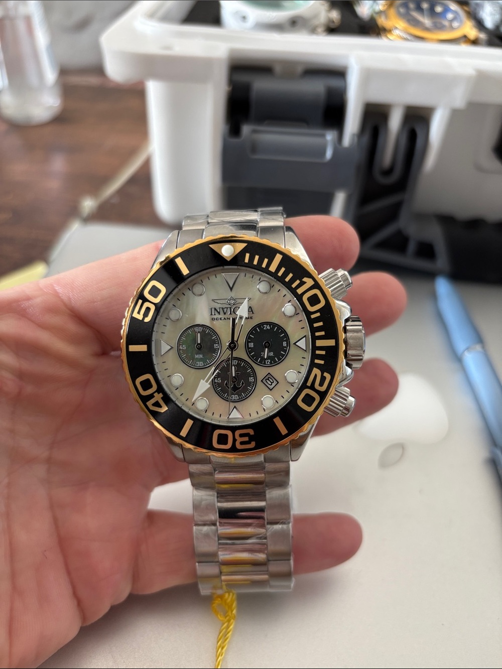 Invicta Grand Diver Men’s Silver Stainless Steel Watch with Black and Gold Bezel